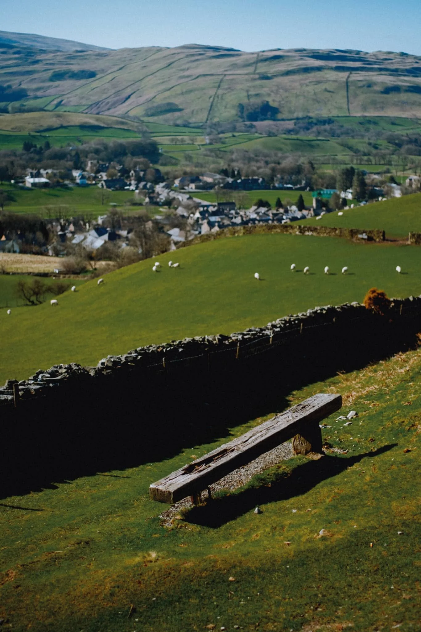 A well-positioned bench offers walkers a rest and a view of the Dentdale fells.