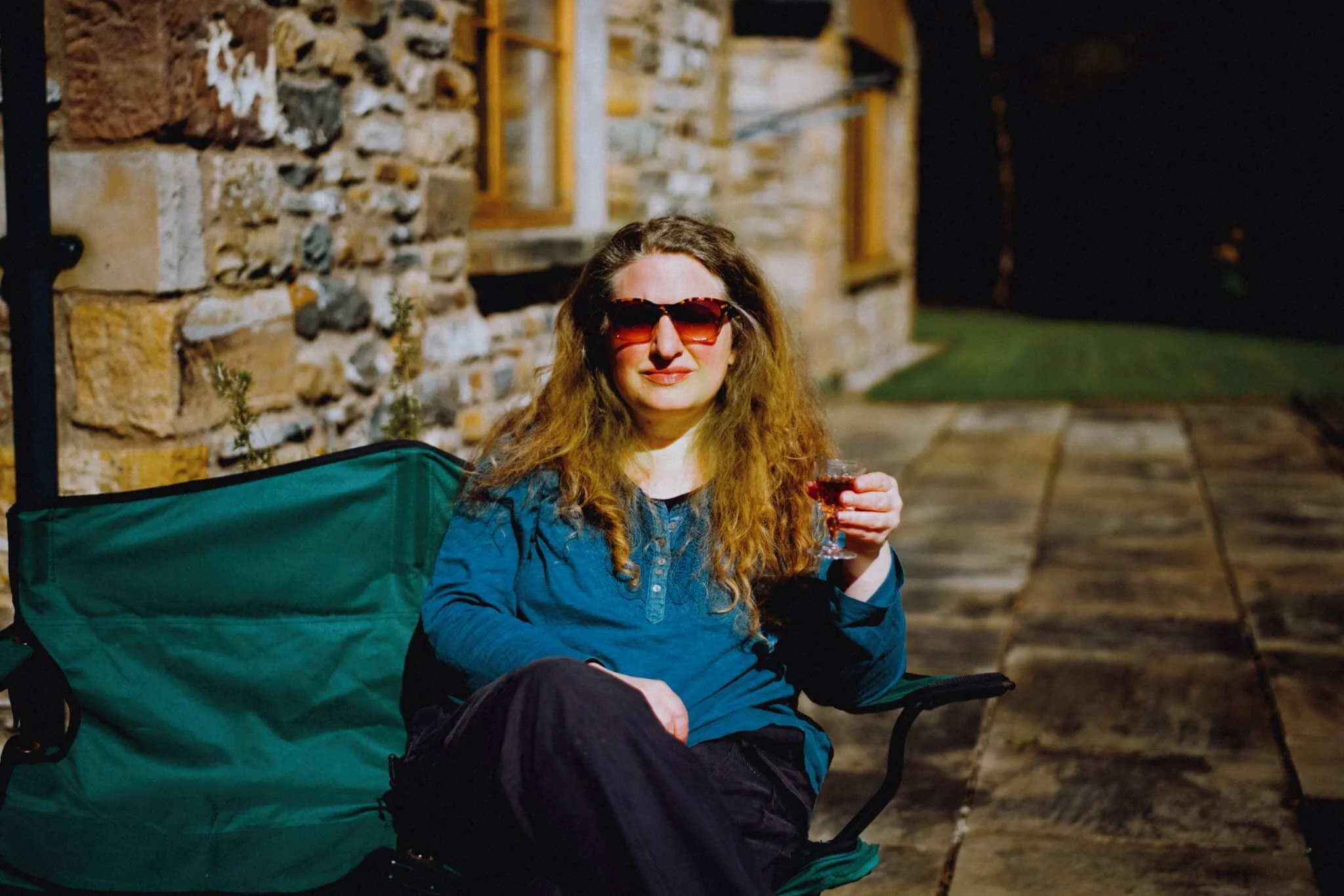 My lovely Lisabet, enjoying a drop of Sherry in her friend’s garden post-walk.