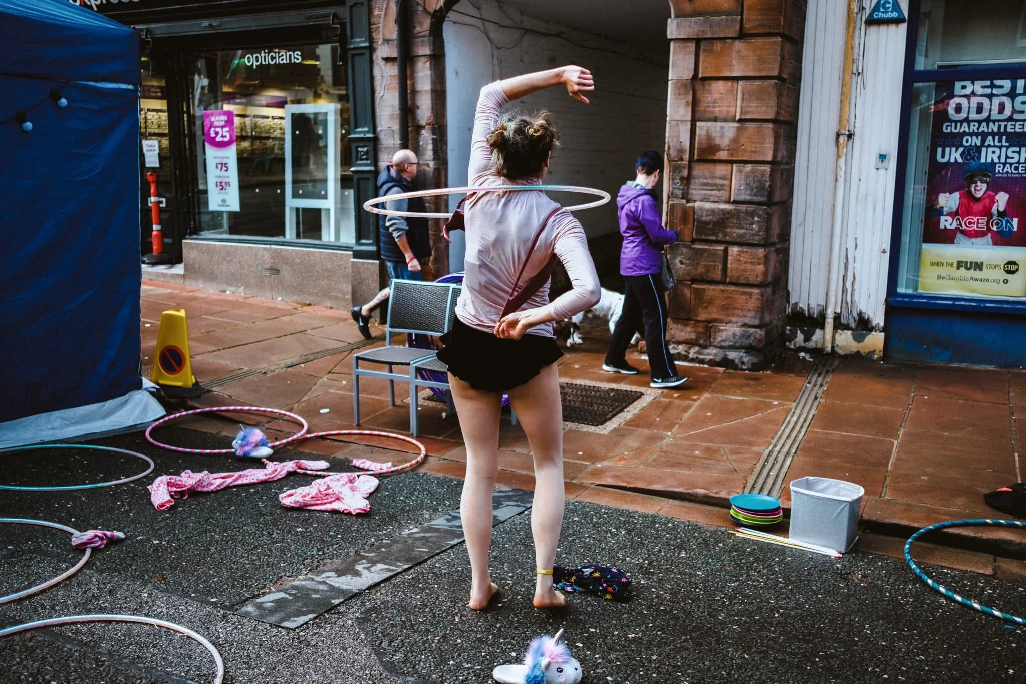  Taking off clothes whilst stilling hula hooping? No problem. 
