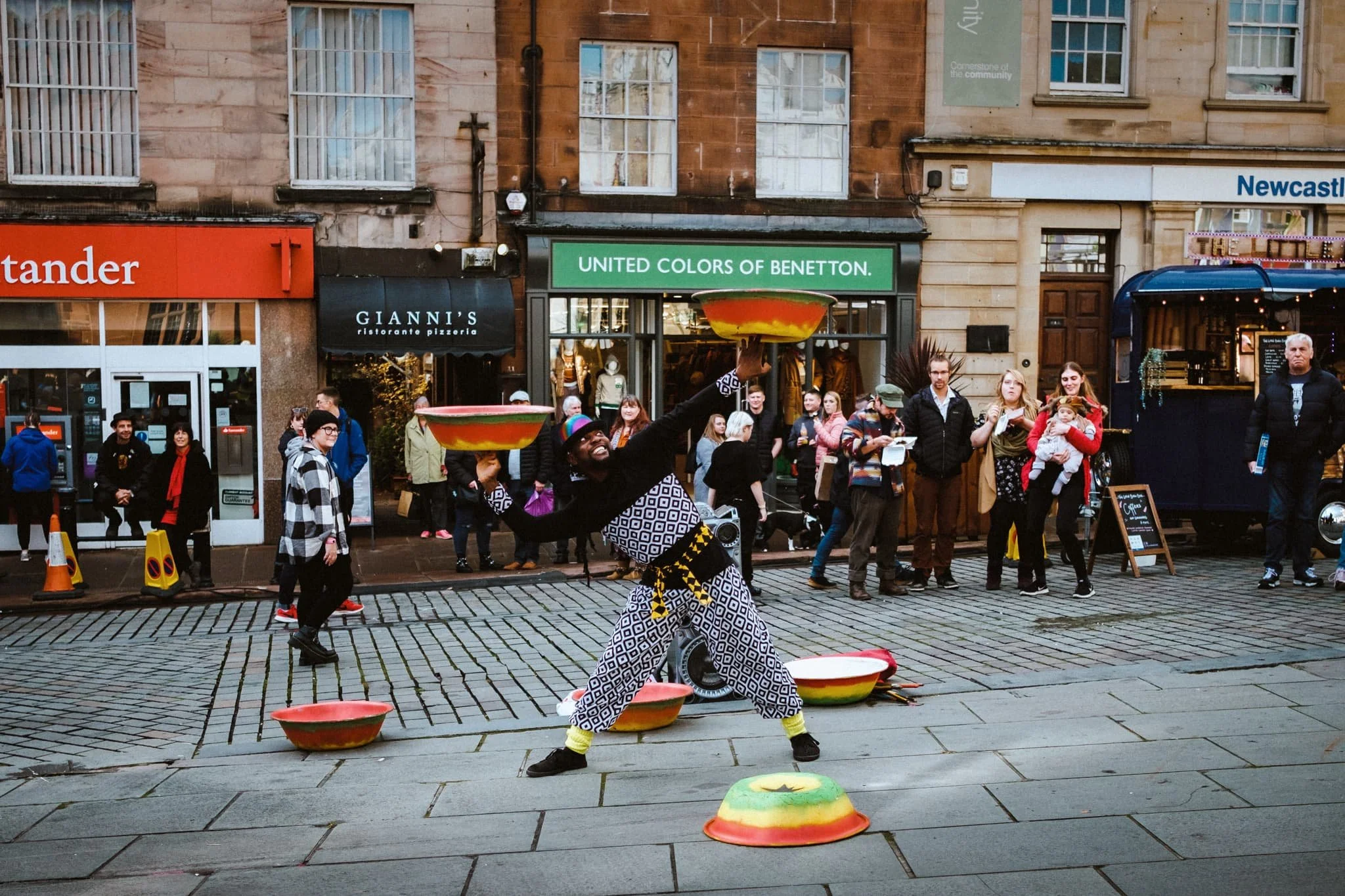  After our tasty food we watched this guy do his incredible balancing tricks and acrobatics. Dude got the whole crowd pumping. 