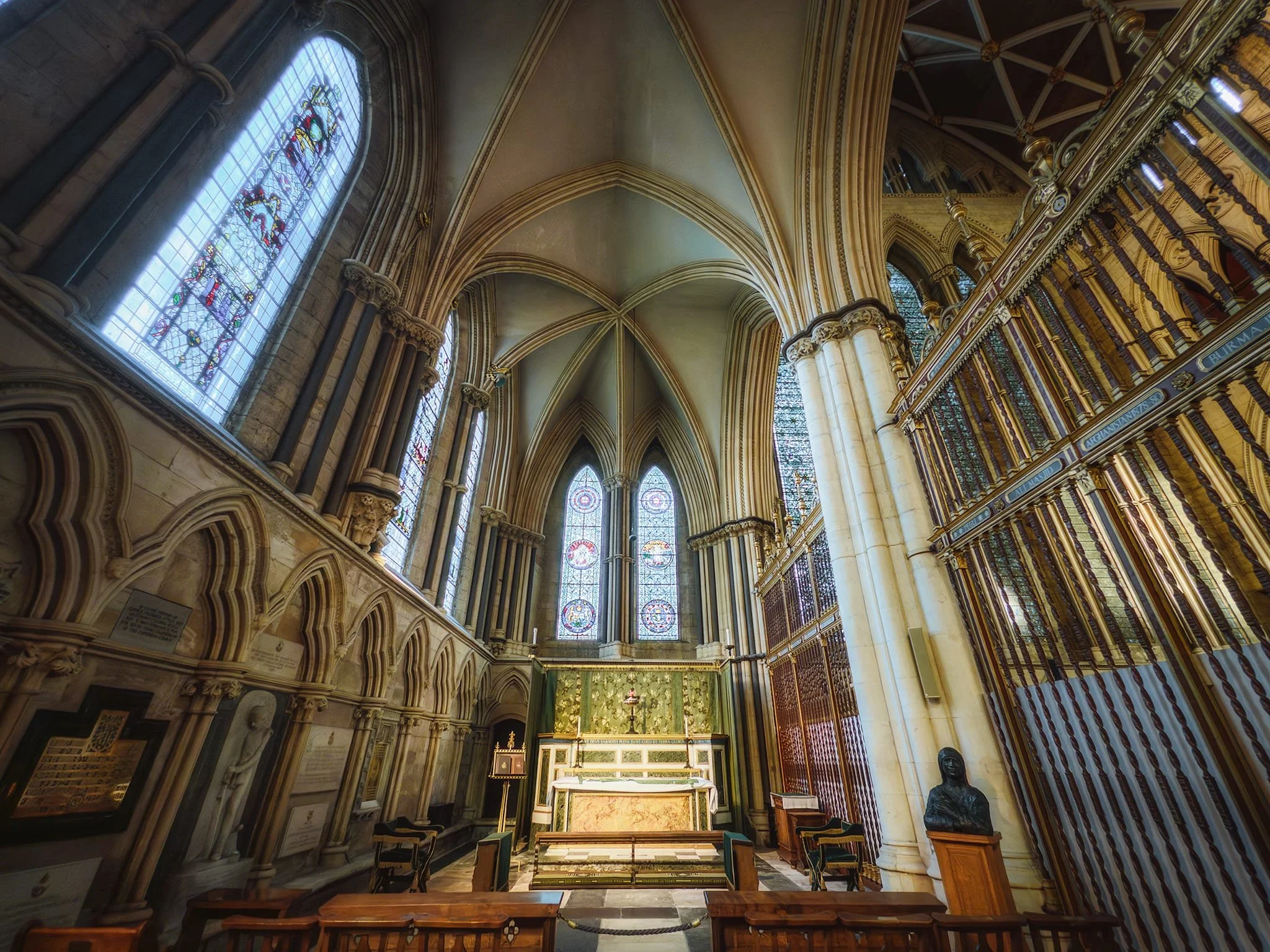 The Chapel of St John the Apostle and Evangelist serves as the King’s Own Yorkshire Light Infantry Memorial Chapel, with 14th-century stained glass from St. John’s, Micklegate, commemorating the regiment’s fallen in World War II (1939–1945).